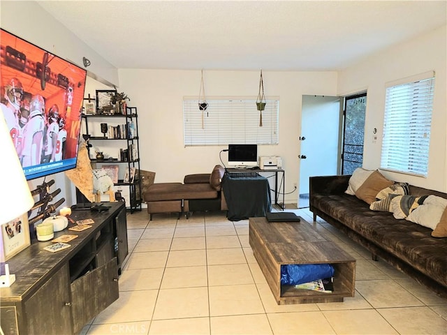 living room featuring light tile patterned flooring