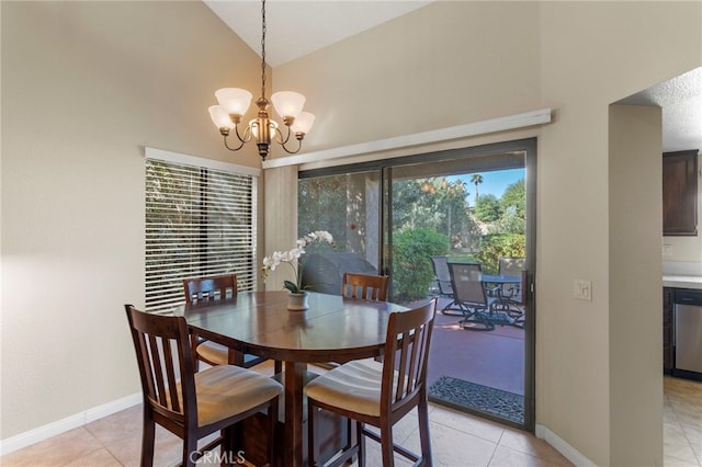 tiled dining room featuring high vaulted ceiling and a chandelier