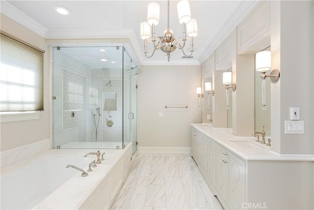 bathroom with a chandelier, vanity, separate shower and tub, and ornamental molding