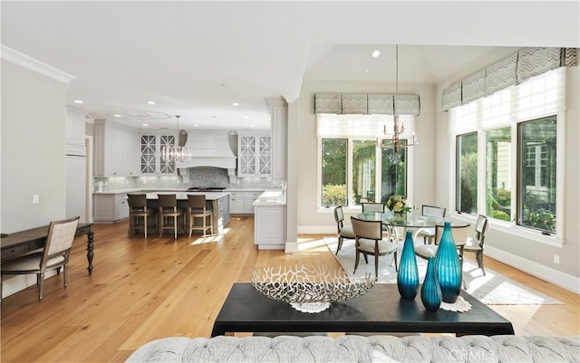 sunroom with an inviting chandelier