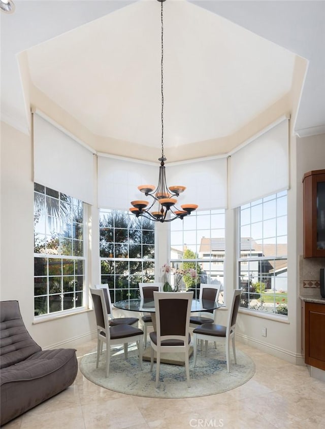 dining room with a notable chandelier