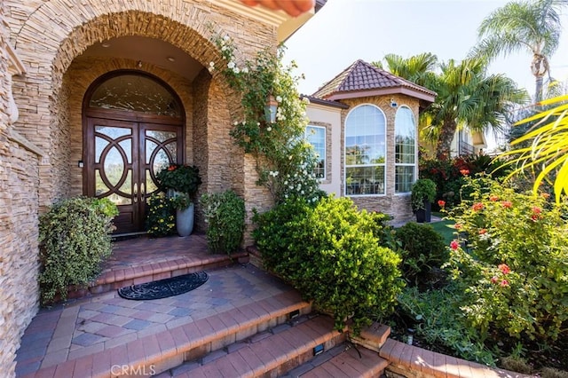 view of exterior entry with french doors