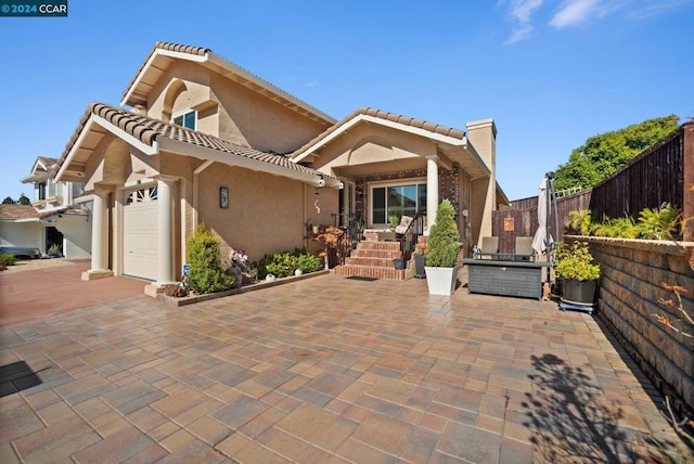 view of front of home with a garage