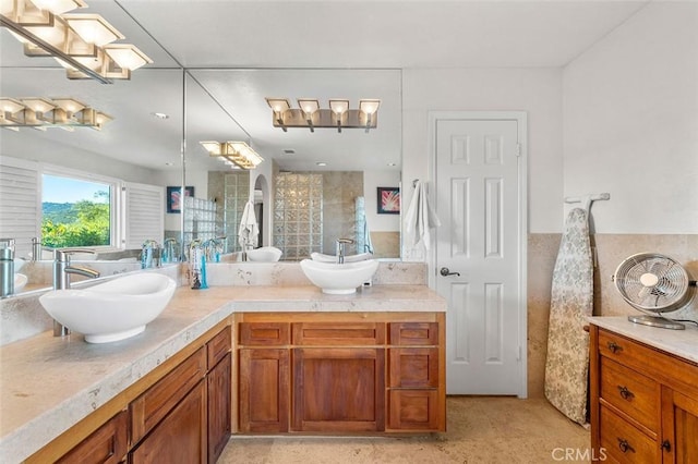 bathroom featuring tile patterned floors and vanity