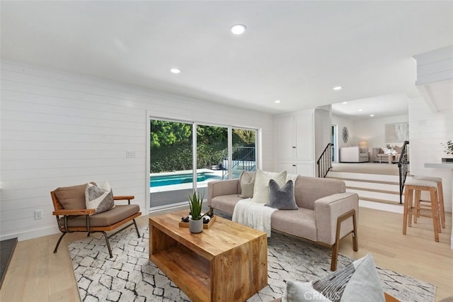 living room with light hardwood / wood-style floors