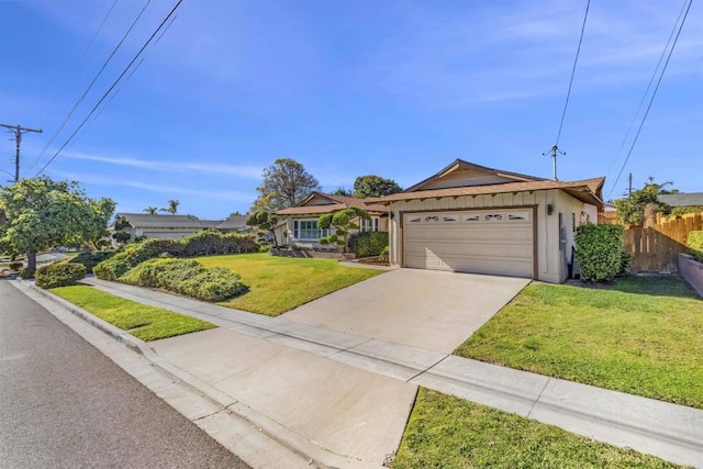 single story home with a front lawn and a garage