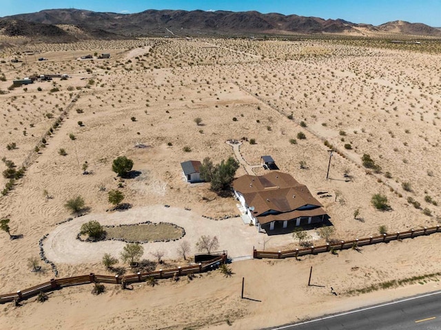 drone / aerial view featuring a mountain view