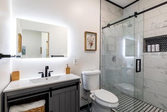 bathroom featuring vanity, toilet, and walk in shower