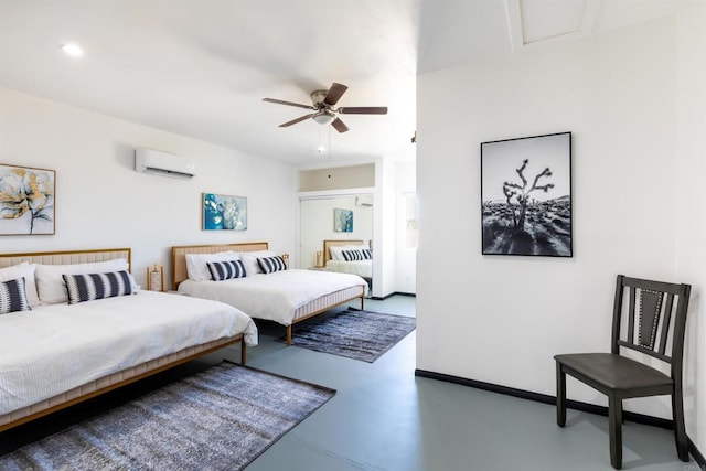 bedroom with ceiling fan, a wall mounted air conditioner, and concrete floors