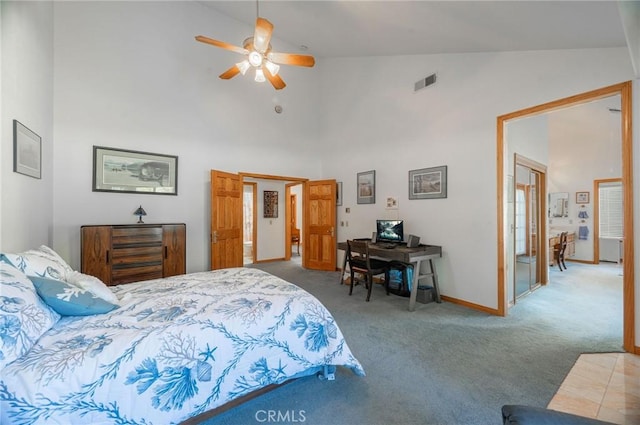 bedroom featuring ceiling fan, carpet floors, and high vaulted ceiling