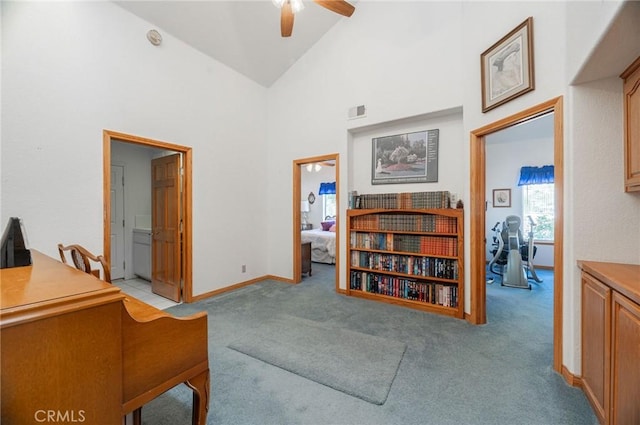 sitting room featuring light carpet, high vaulted ceiling, and ceiling fan