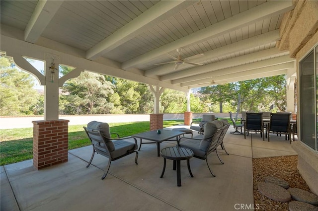 view of patio featuring ceiling fan