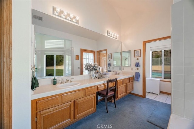 bathroom featuring tile patterned floors and vanity