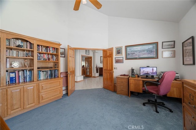 office with ceiling fan, high vaulted ceiling, and light colored carpet