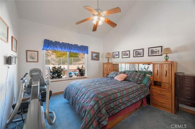 bedroom featuring carpet flooring, high vaulted ceiling, and ceiling fan