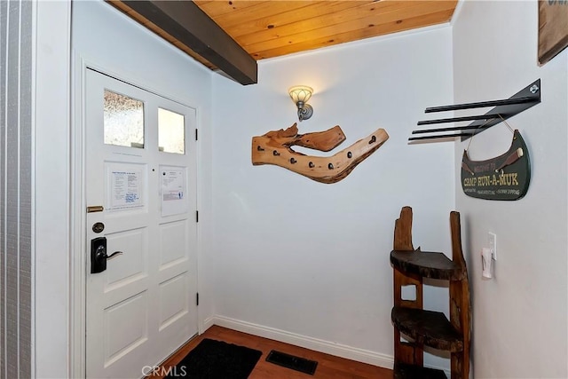 entryway with hardwood / wood-style flooring and wooden ceiling