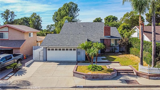 front of property with a garage