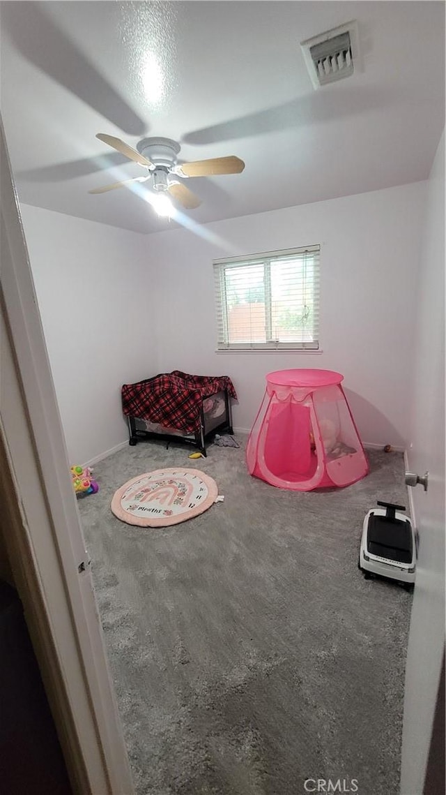 bedroom with carpet flooring and ceiling fan