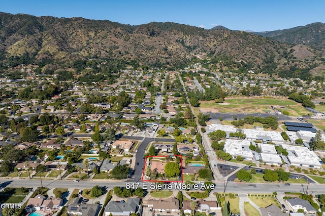 drone / aerial view featuring a mountain view