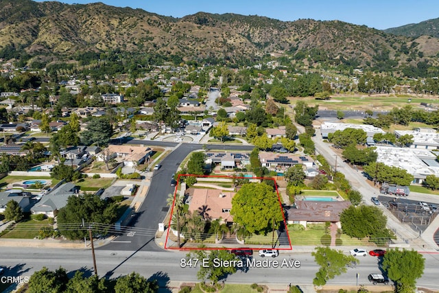 drone / aerial view featuring a mountain view