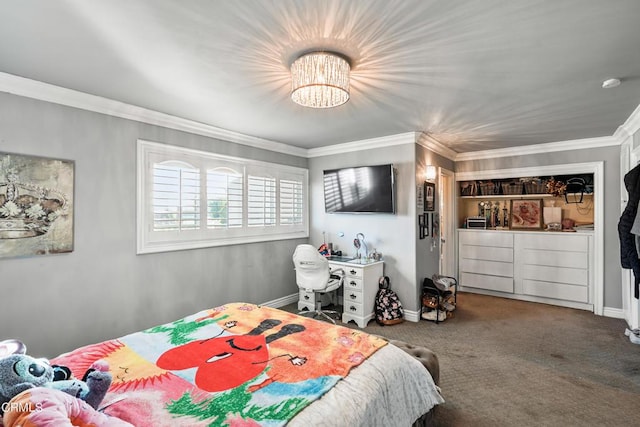 carpeted bedroom with crown molding and a chandelier