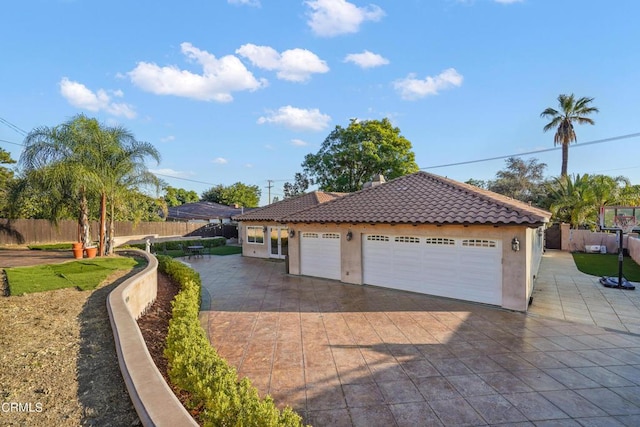 view of property exterior featuring a garage