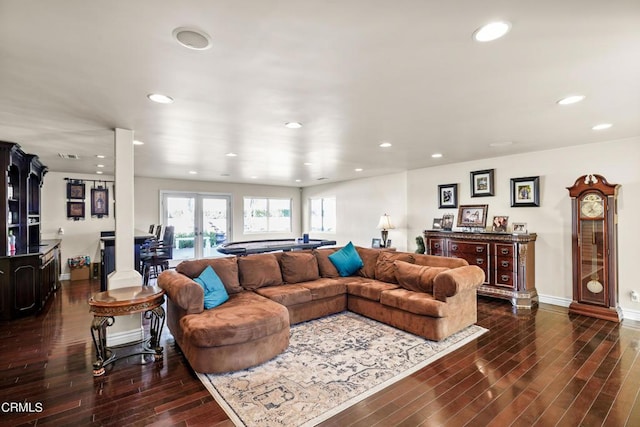 living room featuring dark wood-type flooring