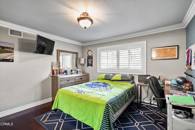 bedroom with dark hardwood / wood-style floors and ornamental molding