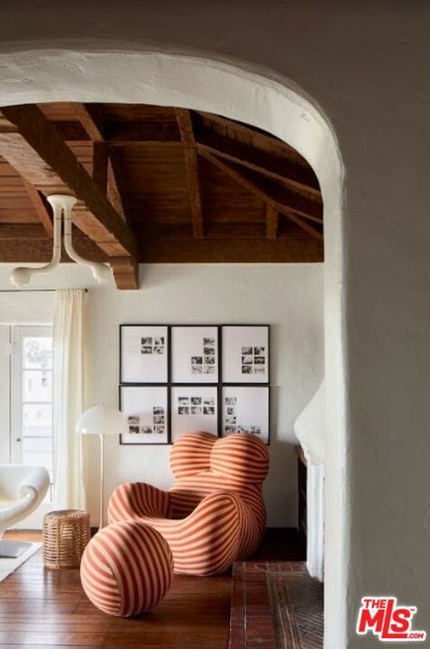 sitting room featuring hardwood / wood-style floors, vaulted ceiling with beams, and wood ceiling