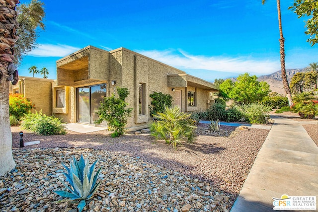 exterior space with a mountain view