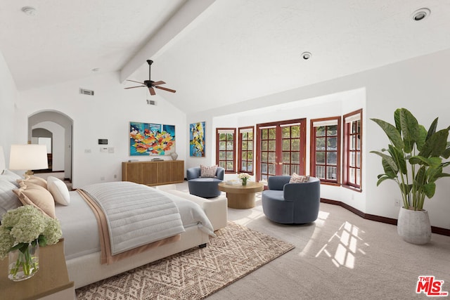 carpeted bedroom with lofted ceiling with beams and ceiling fan