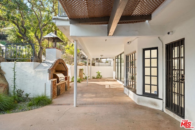 view of patio / terrace featuring area for grilling and french doors