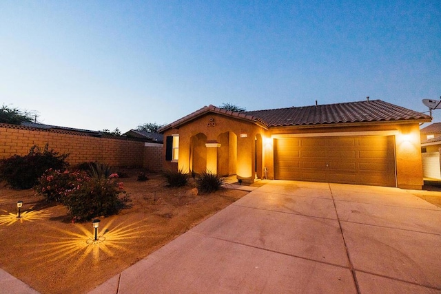 view of front of home featuring a garage