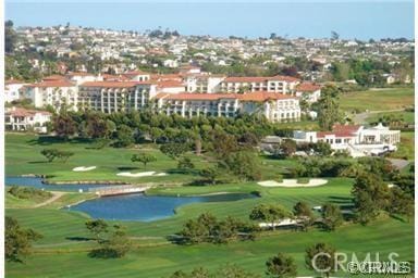 view of home's community featuring a water view