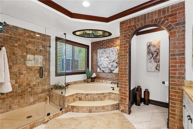 bathroom with crown molding, vanity, and shower with separate bathtub