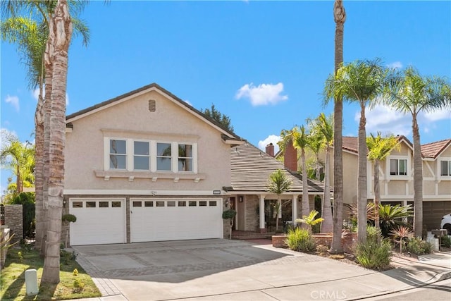 front of property featuring a garage