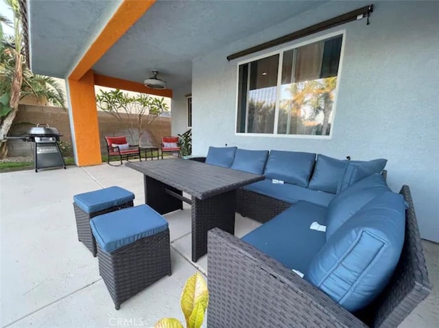 view of patio / terrace with an outdoor living space and area for grilling