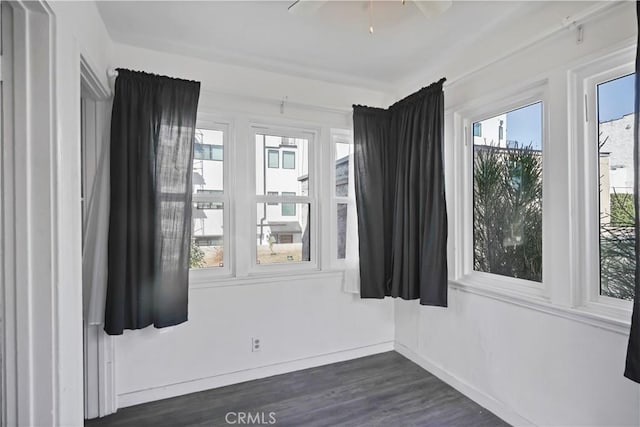 spare room featuring dark hardwood / wood-style floors