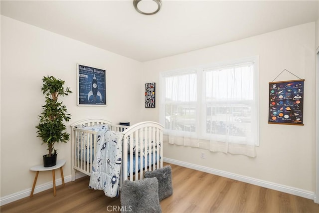 bedroom featuring hardwood / wood-style flooring