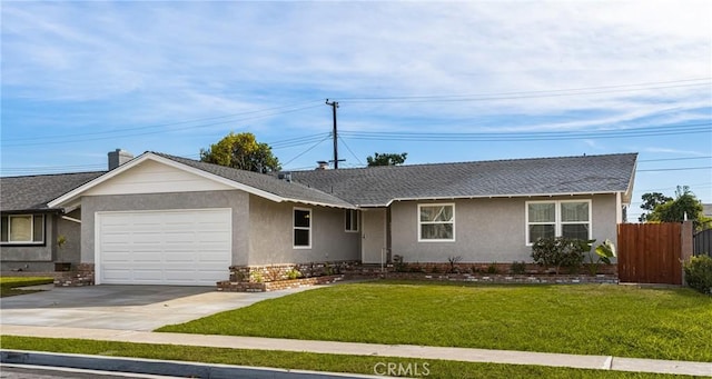 ranch-style home with a garage and a front lawn