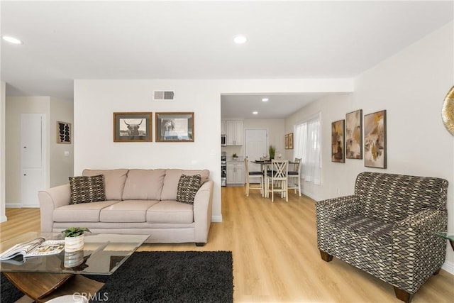 living room featuring light hardwood / wood-style flooring