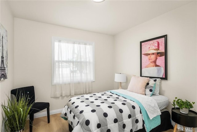 bedroom featuring light hardwood / wood-style floors