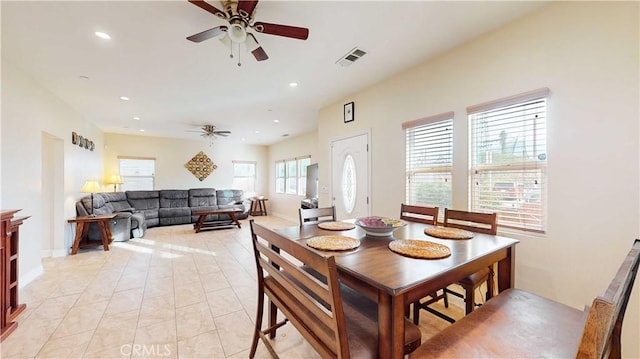 dining room with ceiling fan and light tile patterned floors