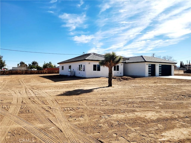 ranch-style home with a garage