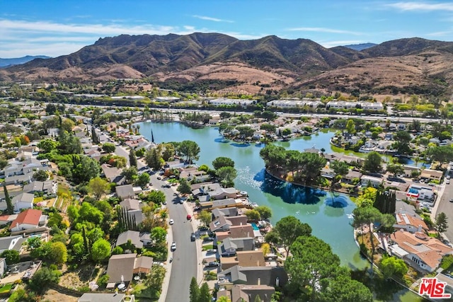 aerial view with a water and mountain view