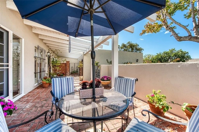 view of patio featuring a pergola