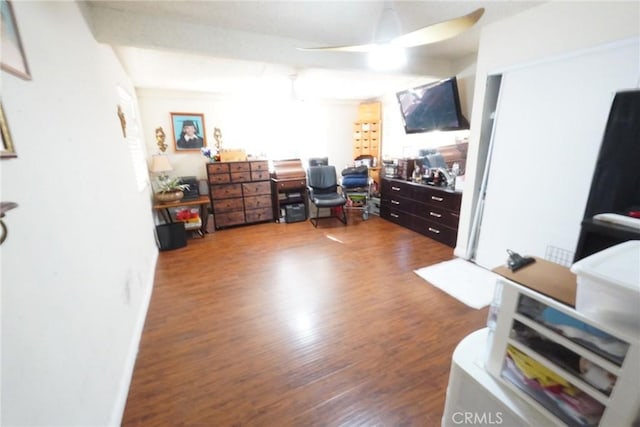 office with hardwood / wood-style flooring and ceiling fan