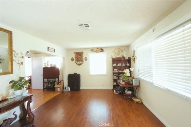 miscellaneous room featuring hardwood / wood-style floors