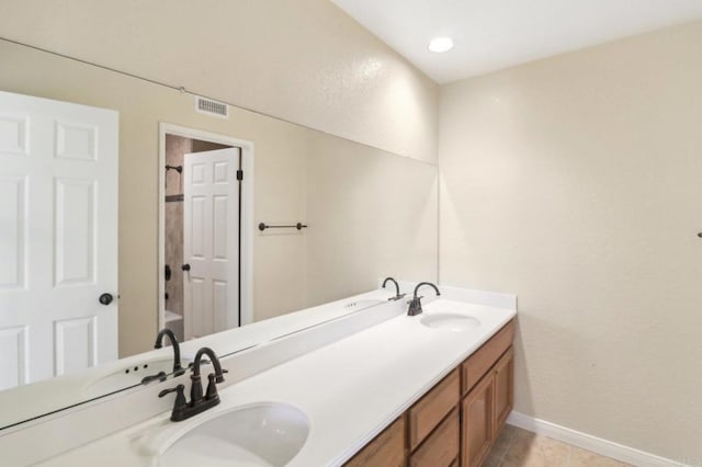 bathroom featuring vanity and tile patterned floors