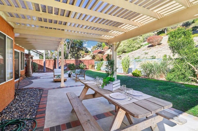 view of patio / terrace with an outdoor living space and a pergola